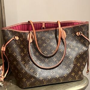 Louis Vuitton Brown Monogram Tote with Pink Interior
Date Code: SD 3129